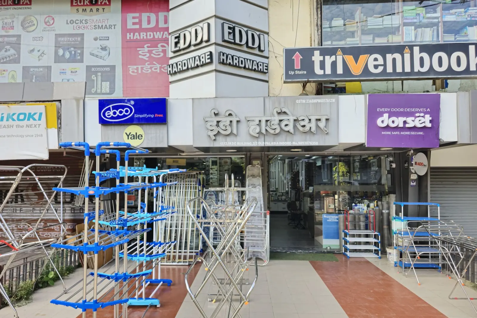 The Eddi Hardware storefront in Old Palasia, Indore, with the corner pillar sign and the Hindi name on the fascia